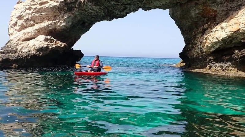 4-hour Ayia Napa SeaCaves Guided Kayaking from Limnara beach - Lovers’ Bridge from the water