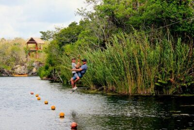 4 Private Cenotes, Zip-Lines, Canoes & Mayan Village with Delicious Lunch