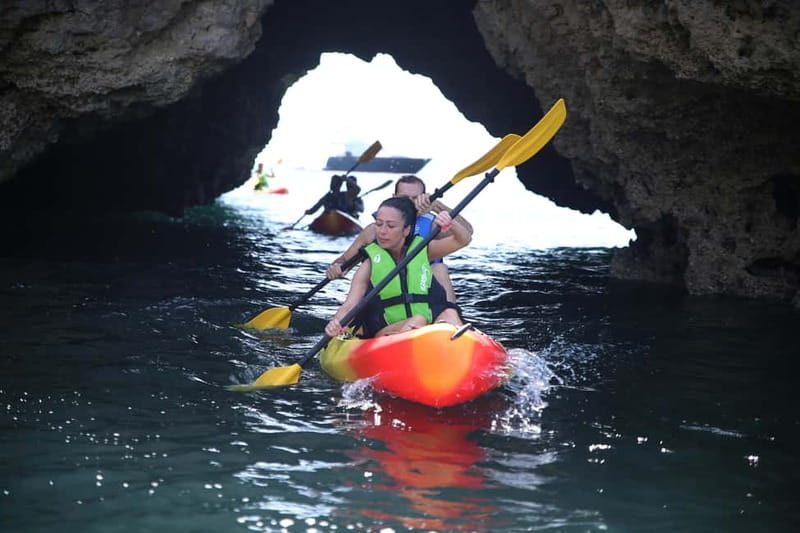 Albufeira: Hidden Beaches & Cliffs Guided Kayak Cave Tour - What the Guides Add