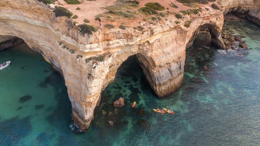 Albufeira Marina: Benagil Cave to Marinha Beach Kayak Tour - How the swimming stops work