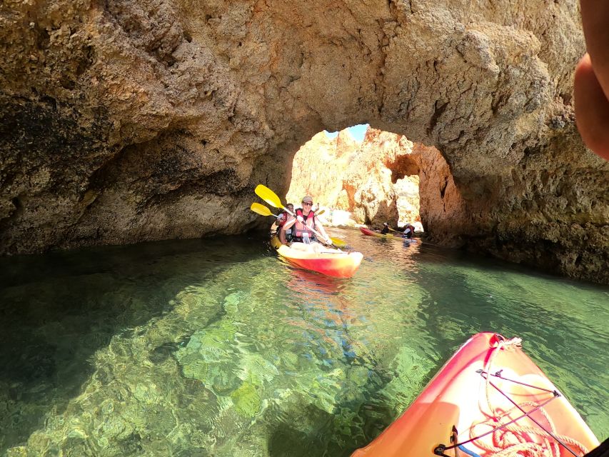 Alvor: Explore Caves Boat and Kayak Tour - Cruising from Alvor toward Praia do Vau