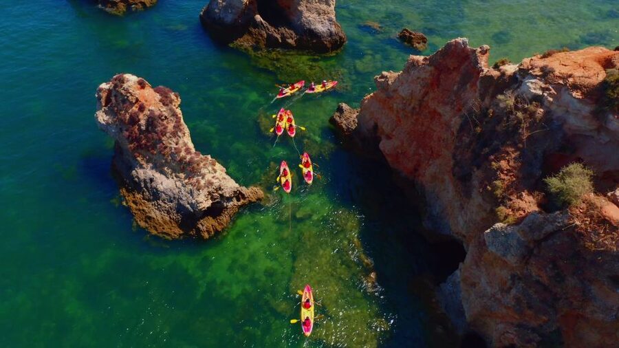 Alvor: Explore Caves Boat and Kayak Tour - A swim from the boat after kayaking