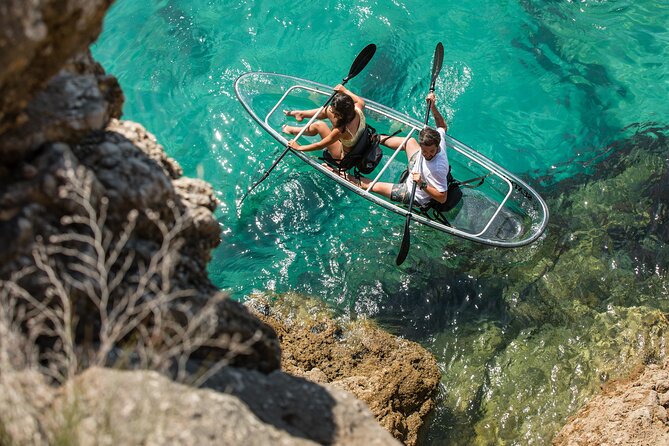 Arrábida: Guided Transparent Kayaking Tour - A calm first paddle through Arrábida