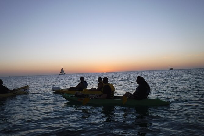 Aruba Night Glass Kayak Tour - Watching the sky change over the coast