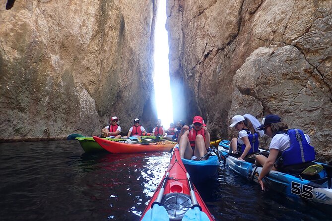 Athens Riviera: Sea Kayak and Snorkeling Adventure with Picnic - Following the rocky coast and nearby islets