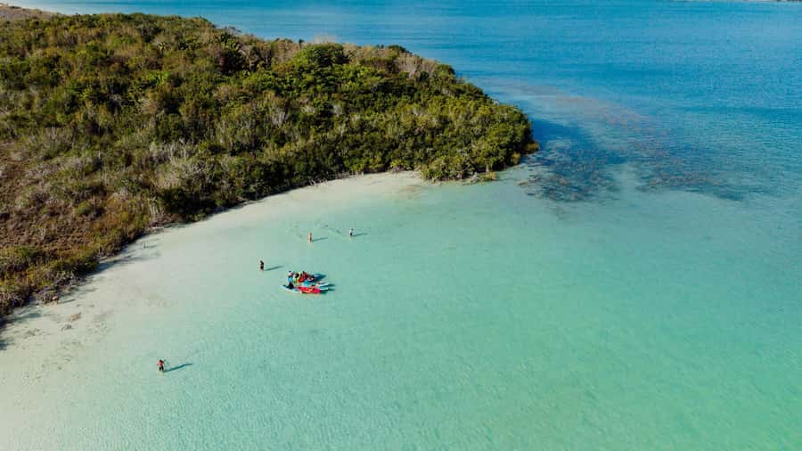 Bacalar at Sunrise: Kayak Adventure with Breakfast & Photos - Paddling through two parts of the lagoon