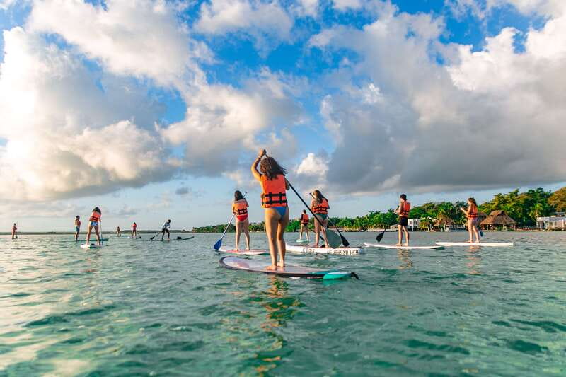 Bacalar: Sunrise Paddleboard Tour with Floating Picnic - Cenote Negro or Cocalitos: swimming and stromatolites
