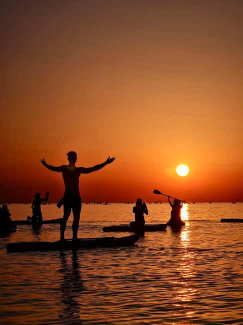 Barcelona: Paddleboarding at Sunrise. Includes: instructor, photos, equipment - What $29 really gets you