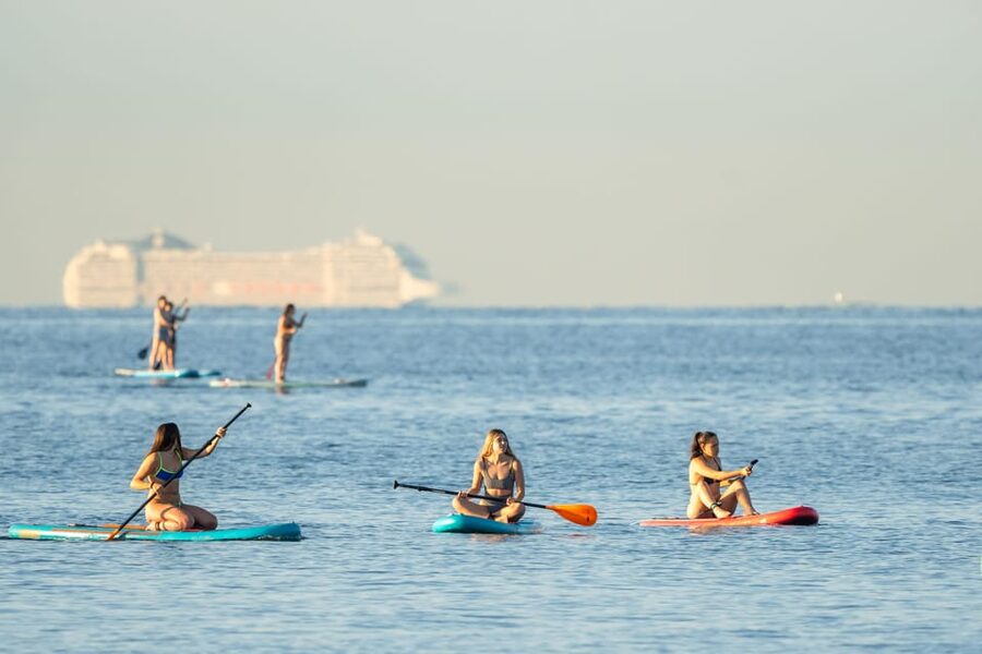 Barcelona: Sunset Paddleboarding Experience with 1 Beer - The beach briefing and first few minutes on the board