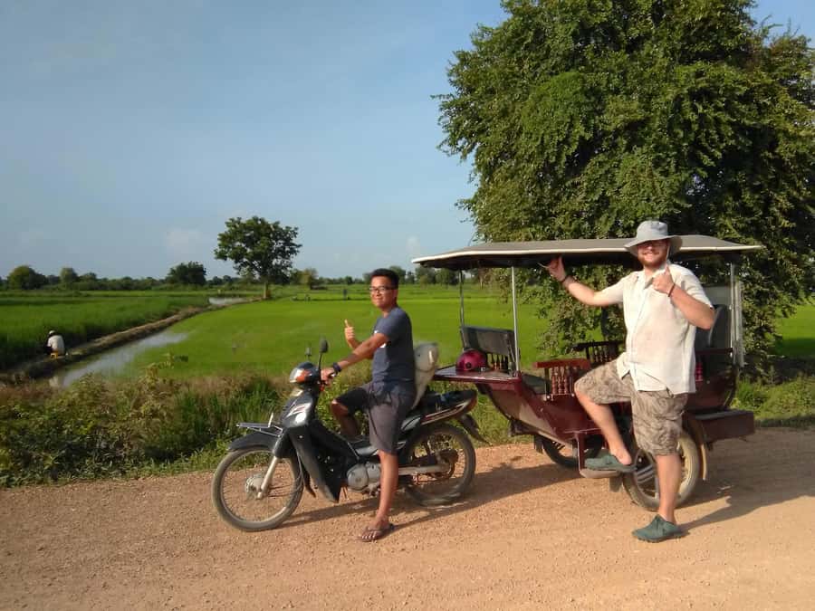 Battambang,Tuktuk and kayak, BambooTrain ,Wat Banan,Bat cave - Rolling through the countryside on the Bamboo Train