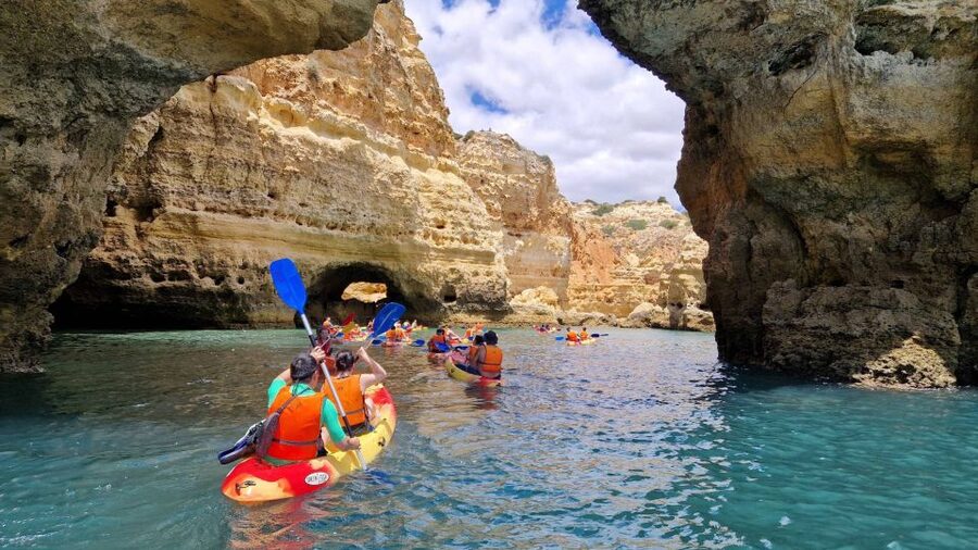 Benagil: Sunrise kayak tour Benagil caves and secret spots - Paddling the cliffs toward Benagil