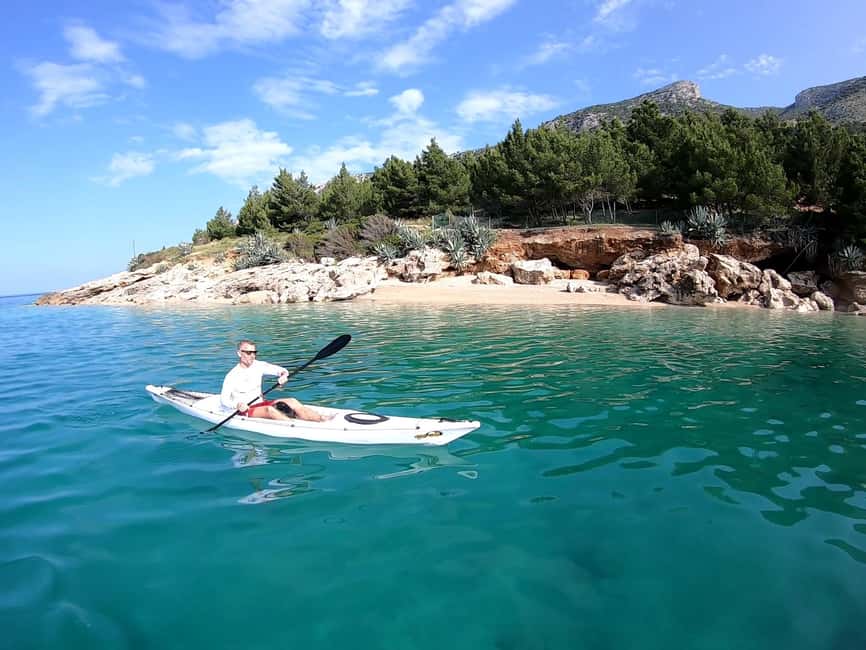 Bol: Zlatni Rat Beach Kayak Tour with Snorkeling - Meeting the guide at the orange and blue flags