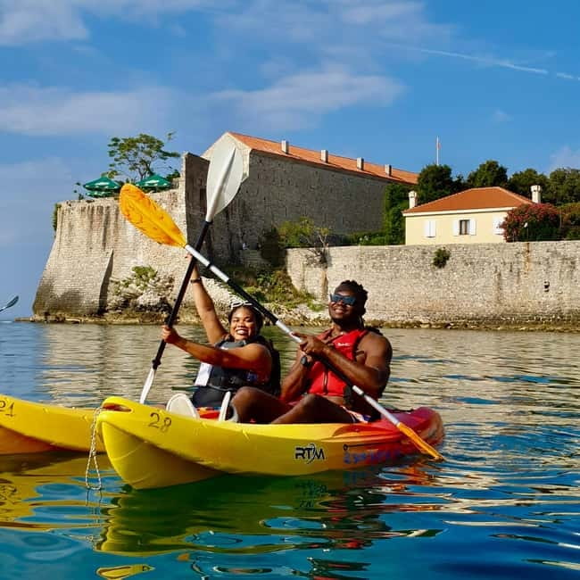 Budva: 3-Hour Paddle Board or Kayak Tour to Coastal Caves - The Dancing Girl and Budva’s open-water views