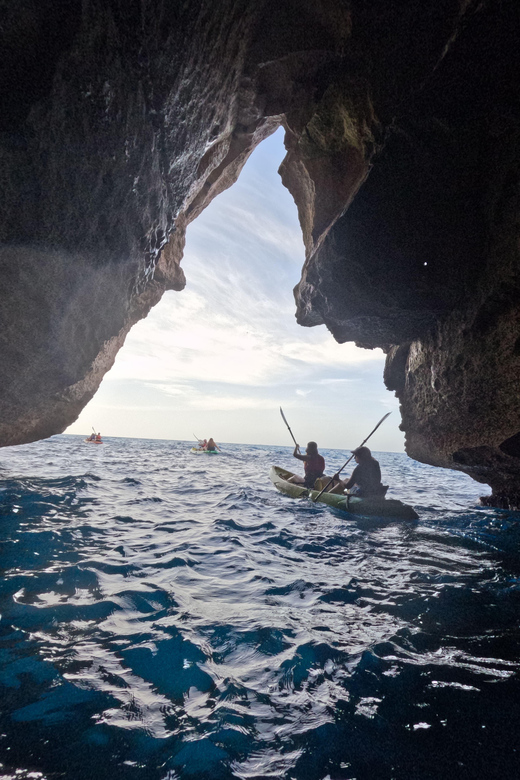 Cala en Porter: Menorca Caves Kayaking Tour & GoPro Photos - Swimming and snorkeling in clear water