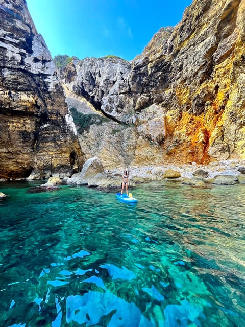 Cala Tango: Marine Reserve Cave & Snorkel Paddle Board Tour - Paddling past Cala del Pope
