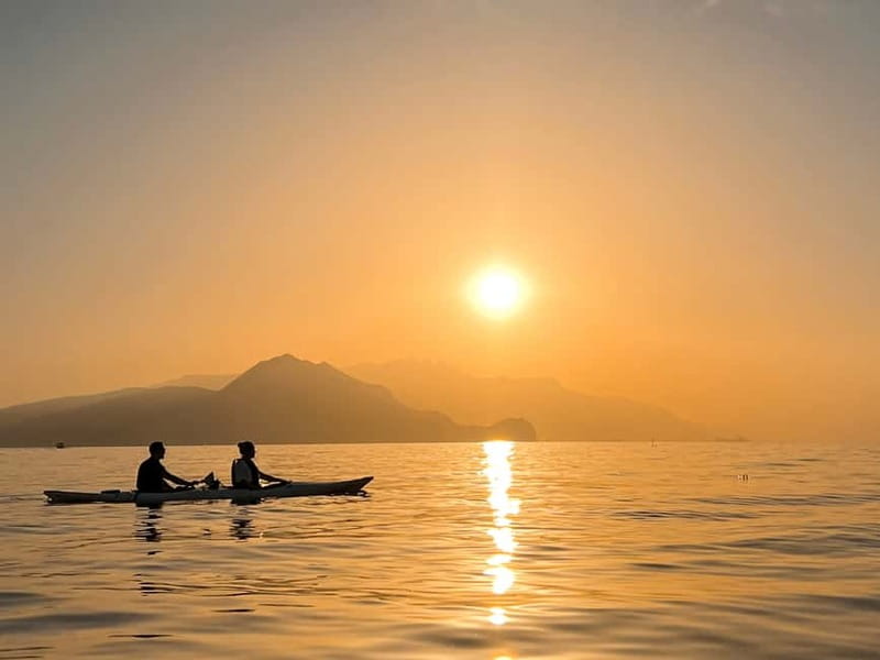 Capri: Caves and Beaches Kayaking Tour with GoPro Photos - The arch of the star and the Faraglioni photo stop