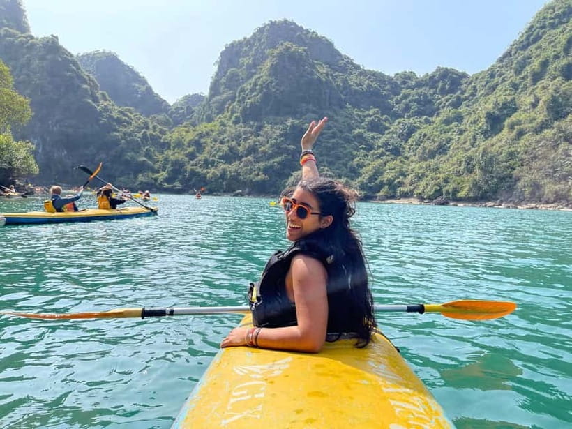 Cat Ba: Day boat tour with: kayak, cave, bike, meal, tickets - Guide quality and the human side of the trip