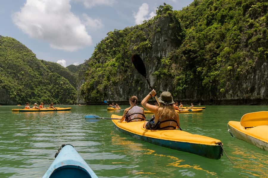 Cat Ba: Lan Ha & Ha Long Bay Kayak & Snorkel Boat Tour - Cruising Lan Ha Bay by traditional boat