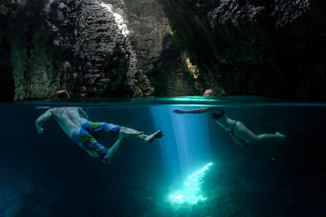 Cave exploring by kayak - Swimming into the cave