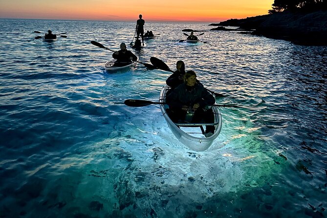 Clear Kayak Glow Night Tour - Paddling across the calm bay toward Fratarski Island