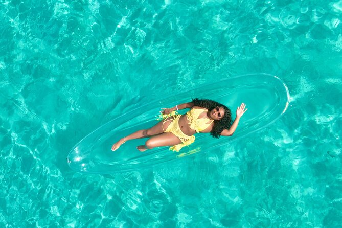 Clear kayak photoshoot Nassau Bahamas. - Who will enjoy this most