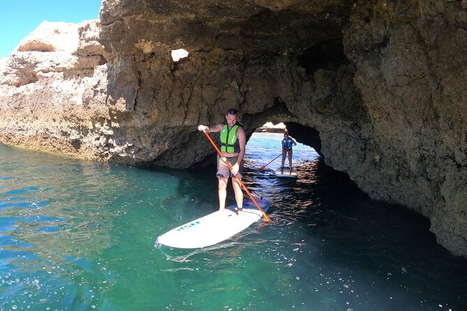 Cliffs & Caves Stand Up Paddle Adventure - Paddling beside the cliffs and into the caves