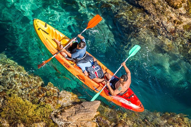 Costa Brava Kayaking and Snorkeling Small Group Tour with Lunch - Paddling below the Camino de Ronda