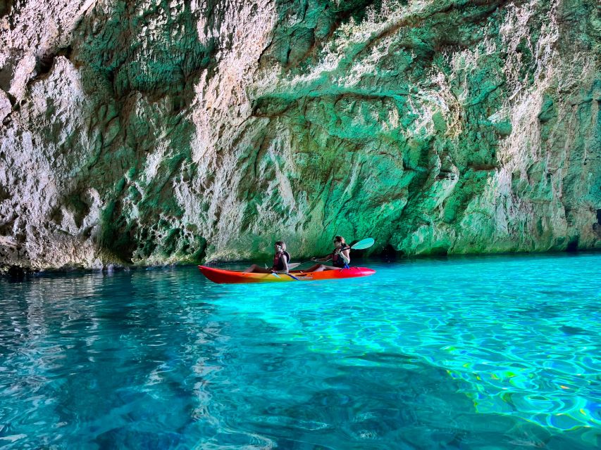Cova dels Orguens: Cave Exploring Kayak & Snorkel Tour - Cliff jumping, with a clear limit