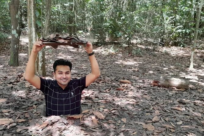 Crawl and Paddle Full day Cu Chi Tunnels and MeKong Delta - Rowboats, Honey Tea, and Village Music