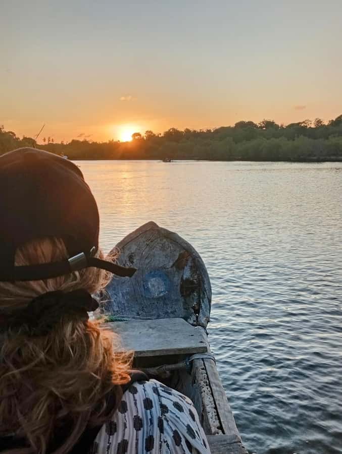 Diani Beach: Kongo River Sunset Experience in a canoe - Boarding a traditional canoe at the estuary