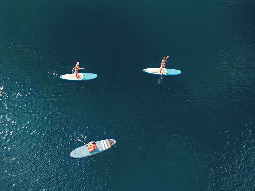 Discover Benagil Caves on a Guided Paddle-boarding Tour - Guides, language, and group size