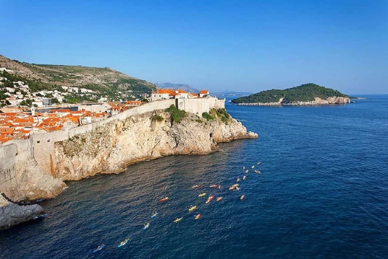 Dubrovnik: Guided Sunset Sea Kayaking Tour with Wine - Betina Cave and the 30-Minute Sea Break