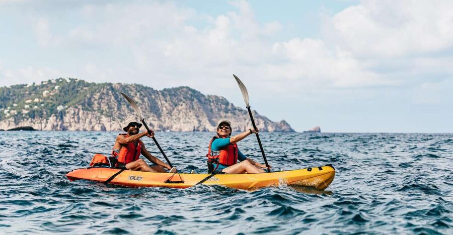 Es Figueral: Guided Kayaking and Snorkeling Tour - Caves, rock passages, and the return paddle