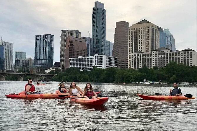 Evening Bat Watching Kayak Tour - Sunset on the way out, city lights on the way back