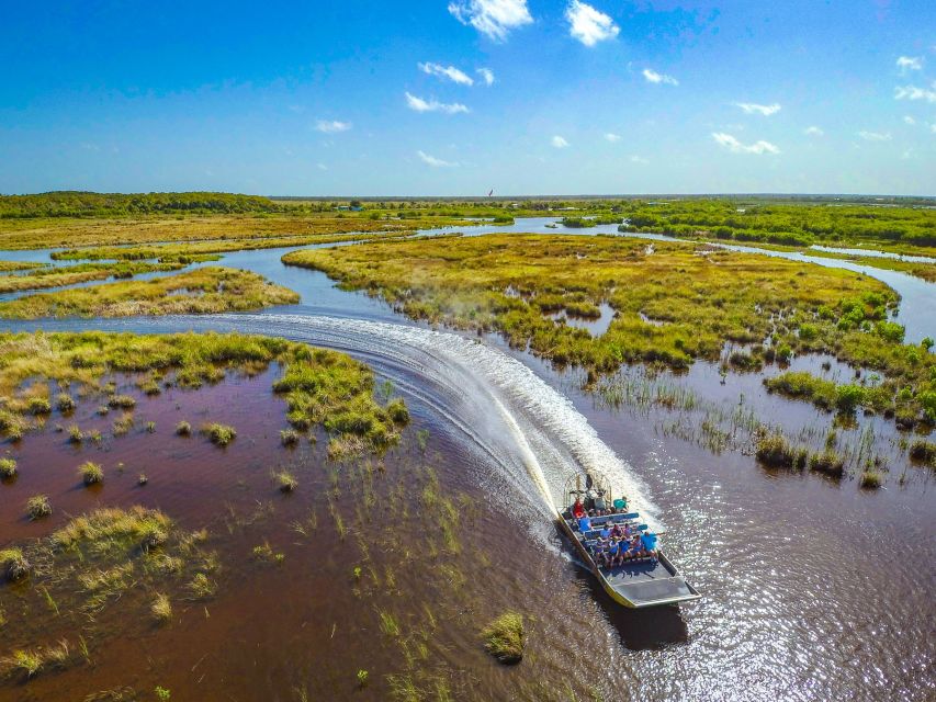 Everglades City: Guided Kayaking Tour and Airboat Ride - Paddling through mangrove tunnels and cypress forest