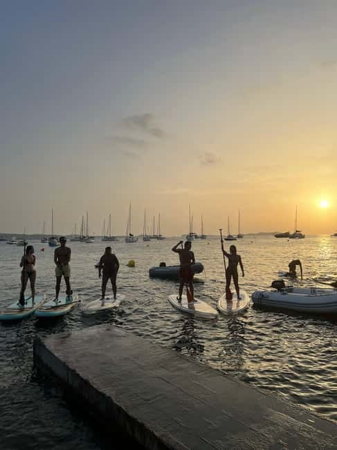Experience Crystal paddle surf Tours + snorkel - A transparent board over Cala Llonga