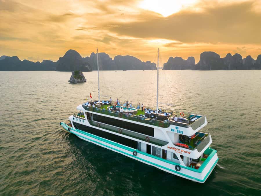 From Hanoi: Ha Long Bay Luxury Day Cruise with Food & Kayak - From Hanoi’s Old Quarter to Tuan Chau Harbor