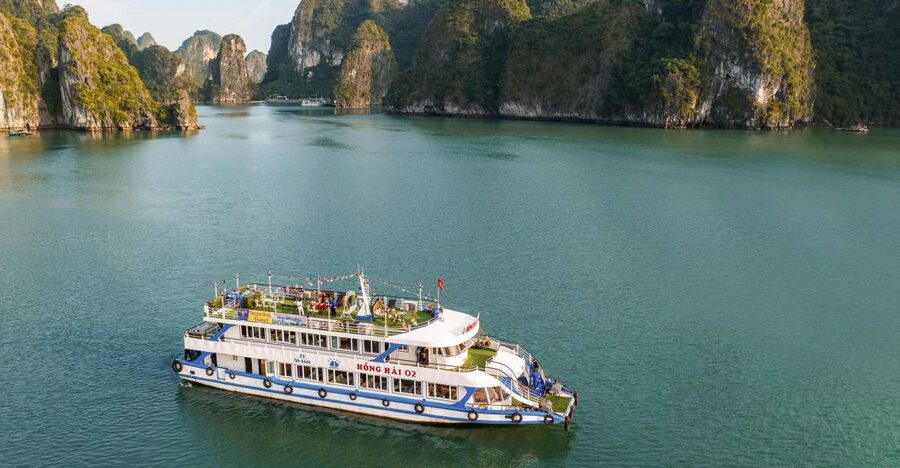 From Hanoi: Halong Bay Day Trip w/ Cave, Island & Kayak - Walking through Surprising Cave