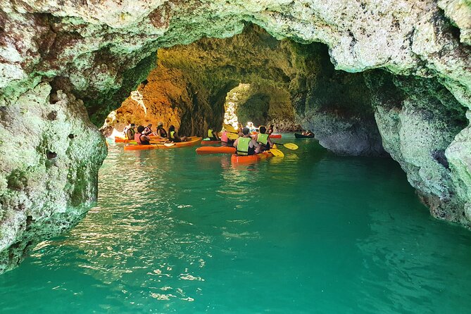 From Lagos: Kayak Tour of Ponta da Piedade Caves on Catamaran - Swimming, the boat slide, and the ride back