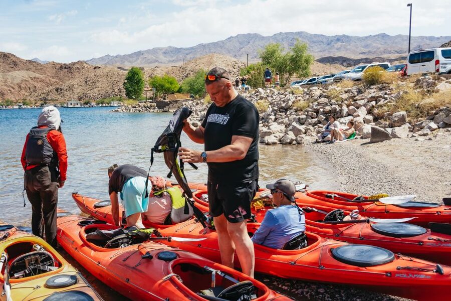 From Las Vegas: Black Canyon Half-Day Kayak Tour - Getting set up beside the Colorado River