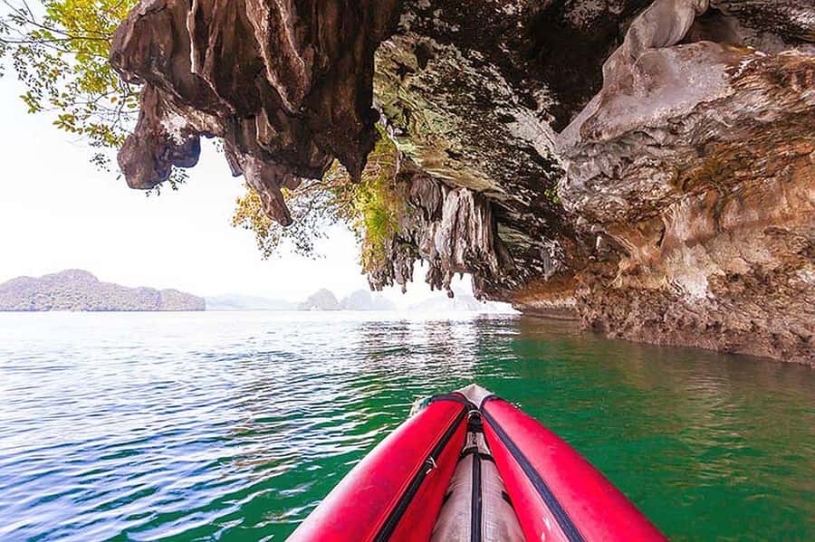 From Phuket: James Bond Sunset Boat Tour & Canoe Adventure - Food, guides, and the human side of the trip