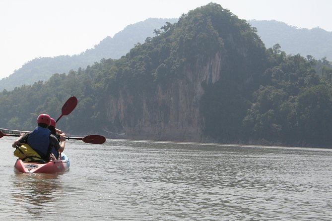 FULL DAY – Kuang Si Waterfall, Kayak on the Nam Ou / Mekong River, Pak Ou Caves - Whisky Village and the smaller countryside stops