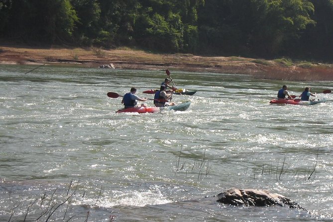FULL DAY – Kuang Si Waterfall, Kayak on the Nam Ou / Mekong River, Pak Ou Caves - Two hours at Kuang Si Falls, if the schedule holds