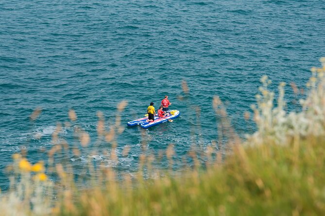 Giant Stand Up Paddle Boarding Experience in Newquay - Weather, changes, and cancellation terms