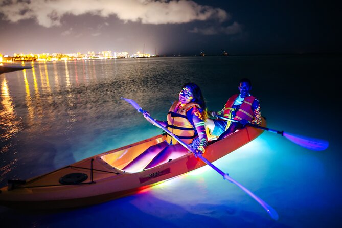 Glow Through the Night with LED Kayak Adventure in Aruba - Paddling beneath city lights