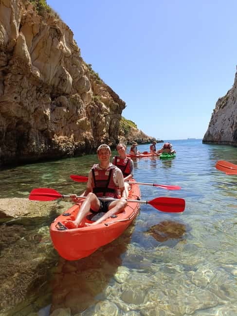 Gozo: 1 Hour Kayak plus +Cave Tour + Drop off Blue Lagoon - What to pack for a wet, sunny day