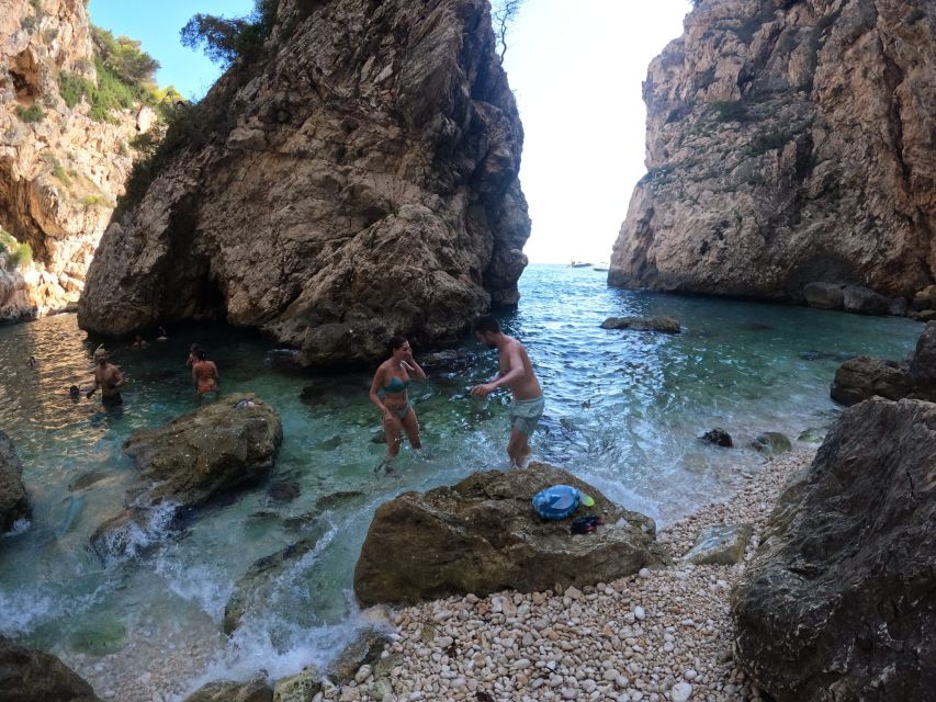 Granadella: Caló, Cova Llop Marí, and Ambolo Kayak Trip - Llop Marí Cave by kayak and water