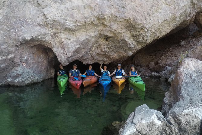 Half-Day Emerald Cave Kayak Tour with Optional Hotel Pickup - Booking, weather, and cancellation details