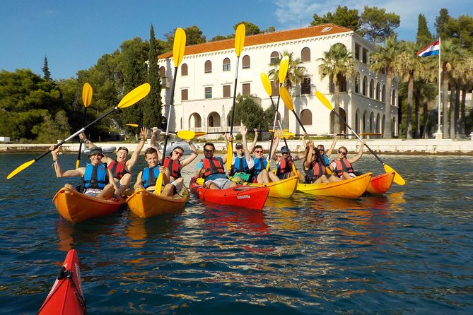 Half-Day Split Sea Kayak Adventure - Following the coast past beaches and rock formations