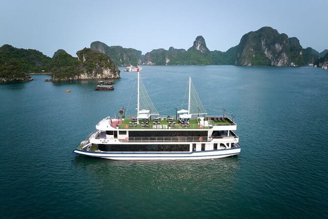Halong bay 4 hours boat tour from Halong city with 2 caves, kayak - Dinh Huong and Hon Ga Choi, Ha Long Bay’s famous symbols